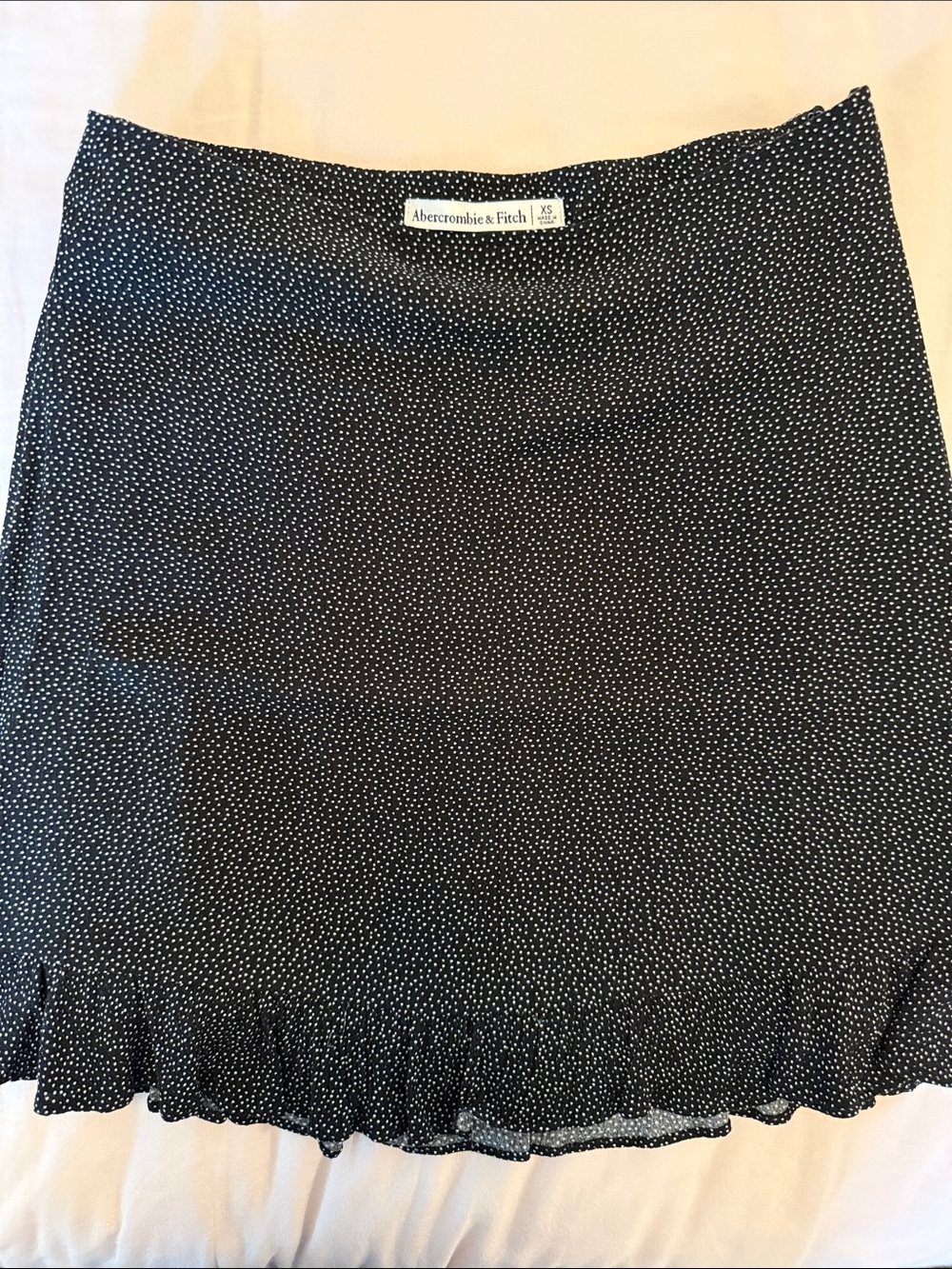 Abercrombie & Fitch Black Mini Skirt with White Dot Ruffle Hem (XS)